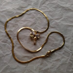 Aurielle Crystal Bow Pendant Necklace – Gold Plated Snake Chain